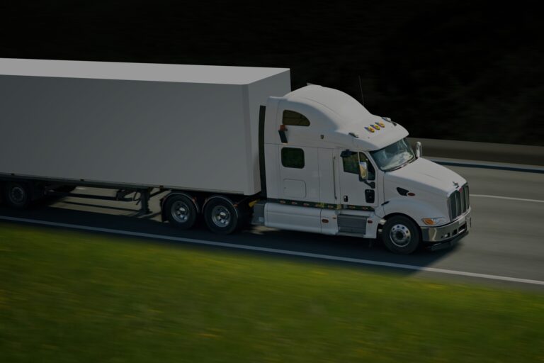 Moving truck driving on highway